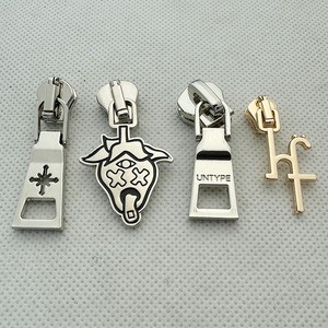 Neostar Competitive Price Custom Golden Color Cheap Metal Zipper Pull for Cloth / Shoe / Bags