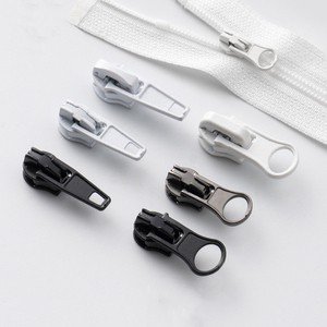 Zipper Manufacturer High Quality 3# Custom Logo Nylon Zipper Slider Puller Head for Garment Bag