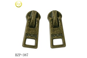 Fashion Zipper Puller Manufacturers Clothing Accessory Metal Zipper Type Antique Logo Zipper Slider Tags for Handbag Hardware